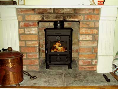Finished fireplace with a Morso 1410 Multifuel