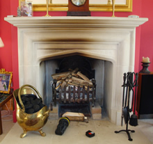 Open Fire with smoke damage to the fire surround